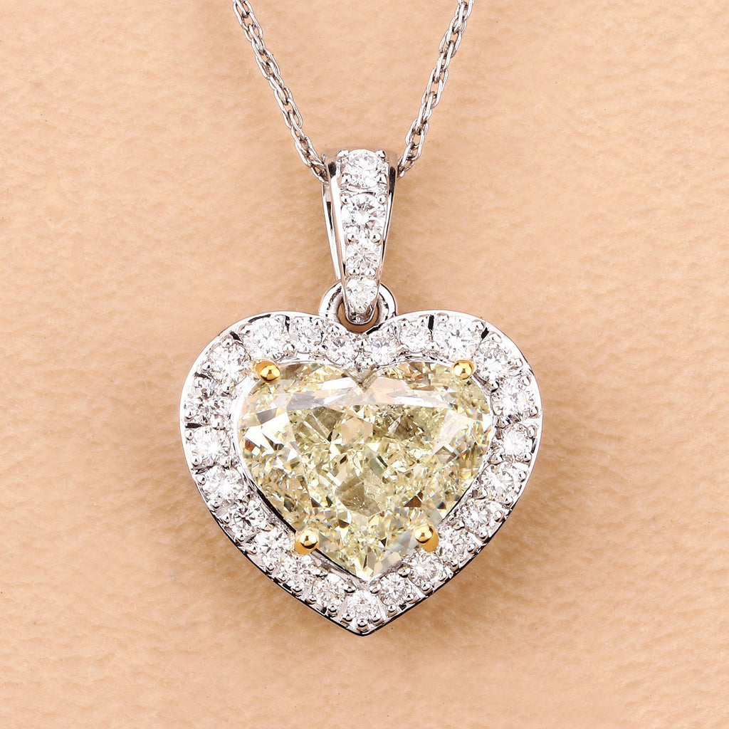 IGI Certified 4.51 Carat Genuine Light Yellow Diamond Center and 0.45cttw White Diamond 18K White Gold Pendant (4.96cttw)