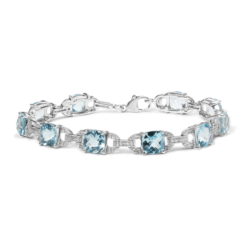 .925 Sterling Silver 7x7 mm Cushion Cut Blue Topaz and 1/20 cttw Round Cut Diamond Fashion Tennis Bracelet (I-J Color, I1-I2 Clarity) - 7"