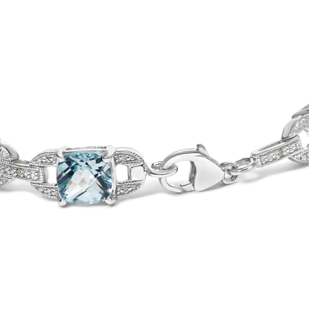 .925 Sterling Silver 7x7 mm Cushion Cut Blue Topaz and 1/20 cttw Round Cut Diamond Fashion Tennis Bracelet (I-J Color, I1-I2 Clarity) - 7"