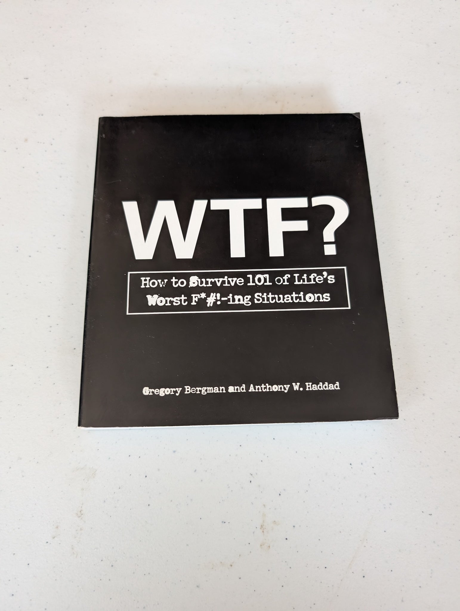 WTF? How to Survive 101 of Life's Worst F*#!-ing Situations Book by Anthony W. Haddad and Gregory Bergman
