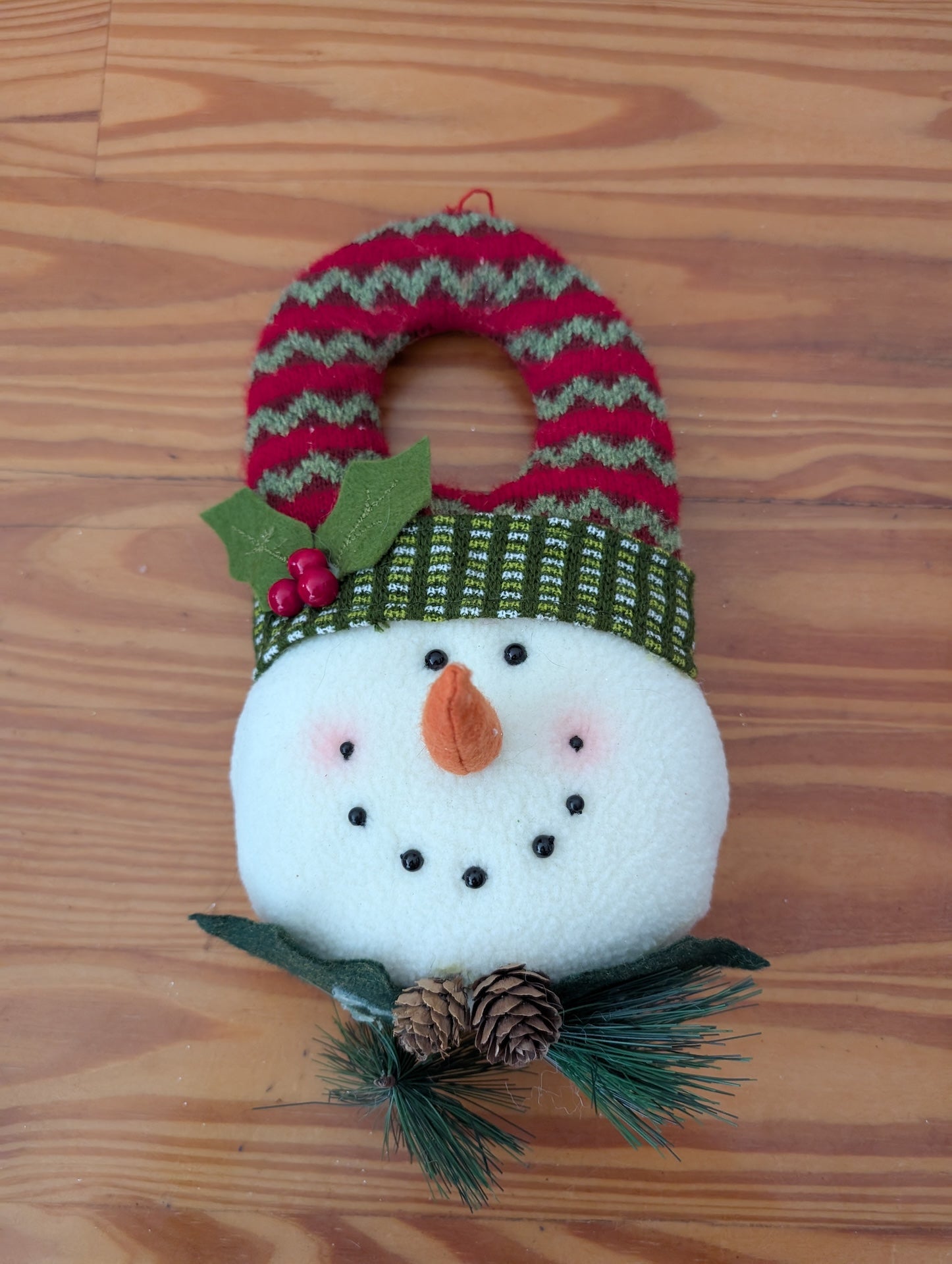 Snowman Head Door Hanger from Unknown -  Holiday Decor (Fabric, Knit, Pinecones Decor, Rustic, Farmhouse, White, Red, Green)